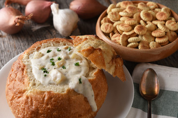 Closeup of a bread bowl of New England Clam Chowder