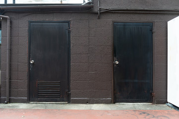 Naklejka na ściany i meble sidewalk by street wall & door