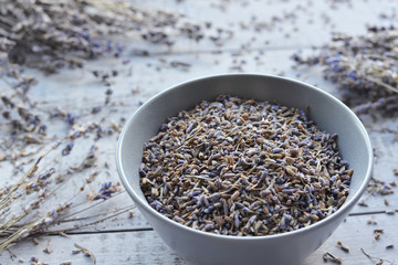 natural dry lavender flowers tea in ceramic bowl