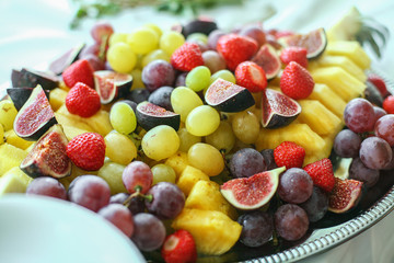 Different colorful fruit and berries close-up. Food background.