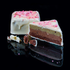 Chocolate candies, handmade. Three chocolates in a farine