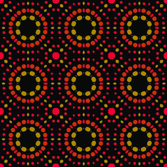 Seamless abstract pattern background with a variety of colored circles.