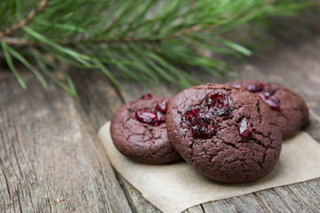 Hommede freshly baked chocolate cookies on wooden background