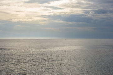 Landscape of the beach at sunset in a cloudy day