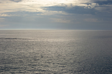 Landscape of the beach at sunset in a cloudy day
