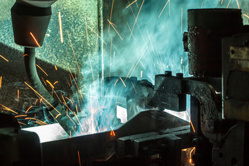 Welder robots movement in a car factory