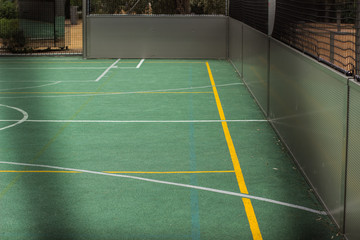 Fototapeta premium accomplishment design concept of football and basketball field place for game with green athletic ground surface and marking