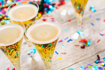 Fototapeta na wymiar NYE2019: Confetti Party Celebration Background With Champagne