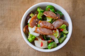 Chinese sausage salad in the dish. Thai food.