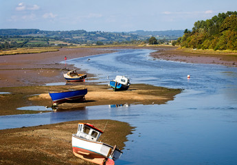 Fototapeta premium The Axe Estuary at mid tide, Seaton, Devon, England, UK.