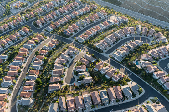 Aerial view of modern cul de sac housing streets in the Porter Ranch area of Los Angeles, California.