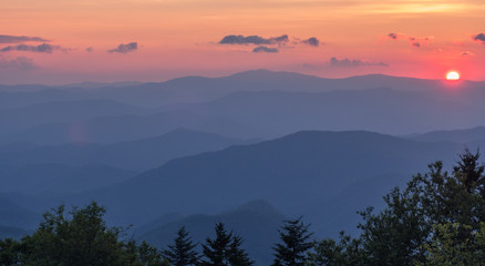Great Smoky Mountains National Park, North Carolina, USA - July 4, 2018: Mountain layers full of colorful foliage right after sunset in the Great Smoky Mountains
