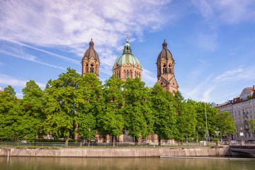 Fototapeta premium Munich Germany, city skyline at Saint Lukas Church and Isar River