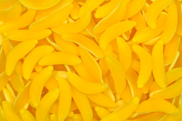 Yellow banana gummy candies. Top view. Jelly  sweets.