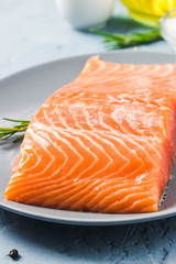 Smoked salmon on plate. Selective focus, space for text.