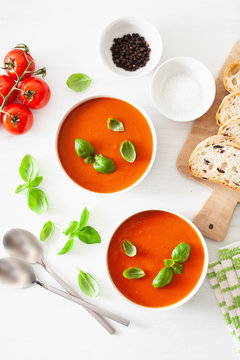 tomato soup flat lay on white backgorund