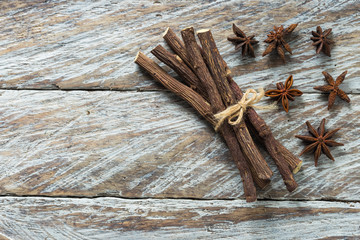 licorice root and anise on the table - Glycyrrhiza glabra