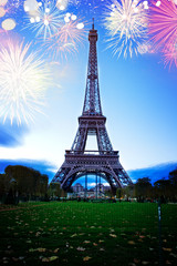 eiffel Tower and light blue night with fireworks, France