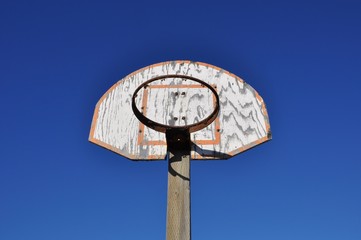 Fototapeta premium Basketball ring without net and board in blue sky