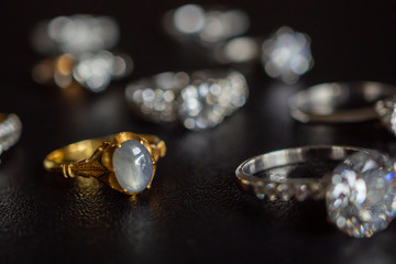 Vintage gold Jewelry blue sapphire and diamond ring on black background