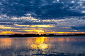 Fototapeta premium Sunset over a lake.
