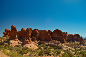 Obraz premium Beautiful nature including rocks,trees and sky in the Arches national park