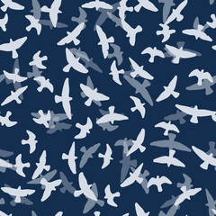 Flying birds seamless pattern. Primitive style.
