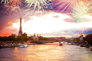 Alexandre III Bridge and Eiffel tower at sunset with fireworks, Paris, France - obrazy, fototapety, plakaty
