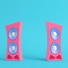 Pink cartoon-styled speaker on bright blue background in pastel colors