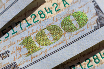 Close-up view on one hundred dollar bill. Macro view on one hundred dollar banknote