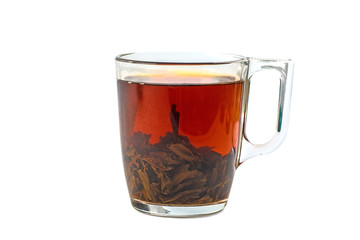 tea in a glass cup isolated on white background