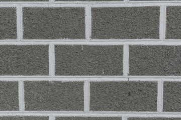 Fototapeta premium Concrete wall texture background with brick pattern