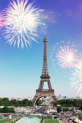 view of Eiffel Tower and Paris cityscape with fireworks, France