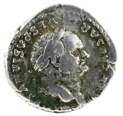 Ancient Roman silver denarius coin of Emperor Vespasian. Obverse.