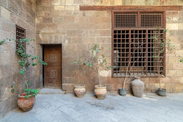 Fototapeta na wymiar Facade of Zeinab Khatoun historic house, located near to Al-Azhar Mosque in Darb Al-Ahmar district, Old Cairo, Egypt