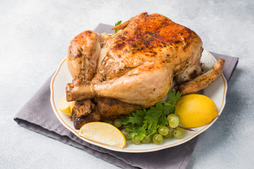 Baked chicken for dinner on the festive table. Copy space