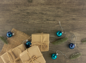 Flat lay,top view Christmas ornaments on wooden background with copy space