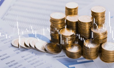 Golden coins stacks on a  background