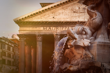 Old fountain and the ancient roman Pantheon in Rome