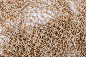 Fishnet on white background. Fishing net. Texture fishnet, seine. Dragnet, drag, trammel, sweep-net