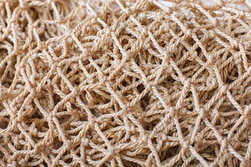 Fishnet on white background. Fishing net. Texture fishnet, seine. Dragnet, drag, trammel, sweep-net