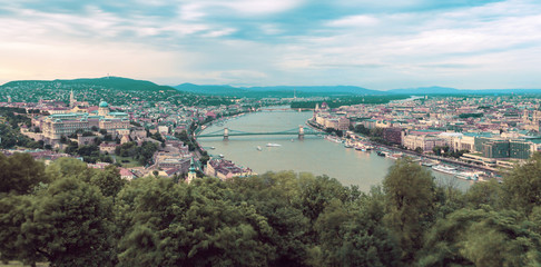 Evening panorama of Budapes from Gellert Hill with a beautiful sunset sky