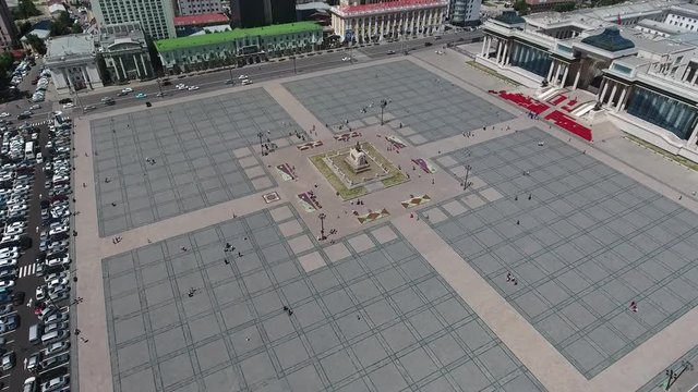 Sukhbaatar square from side view aerial drone shot. Sunny afternoon