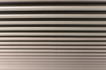 Obraz premium Abstract background from a stack of plastic containers. Focus with shallow depth of field.