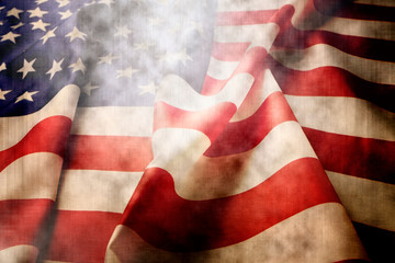 Close up of ruffled American flag. Patriots day, memorial weekend, veterans day, presidents day, independence day background. United States of America national stars and stripes symbol. Copy space.