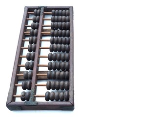 Old and ancient abacus made of wood and attached with a metal plate. On a white background It is a...