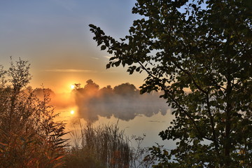 Obraz premium Early morning, sunrise over the lake. Rural landscape. HDR