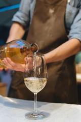 Wine is poured into a glass