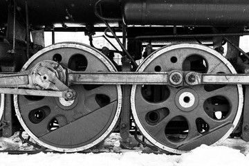 red wheel and detail of mechanism a vintage russian steam train locomotive