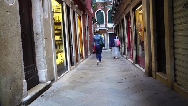 2 Girls walking in Venice